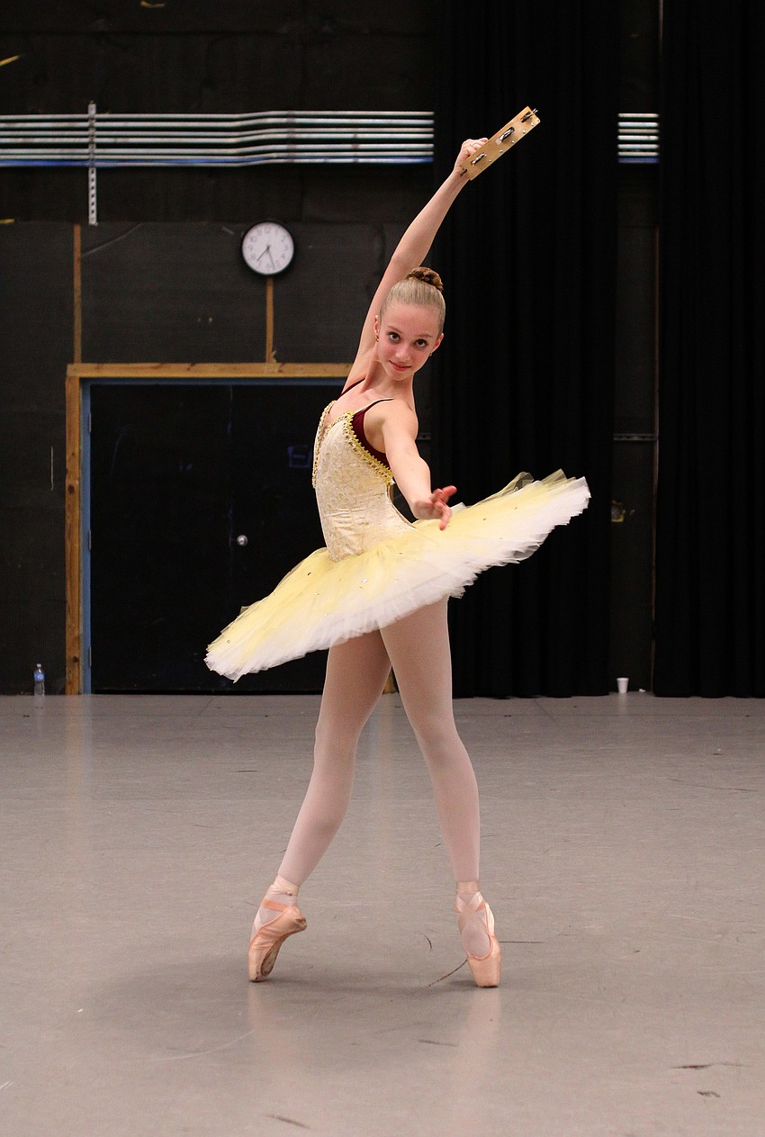 Caitlin Gish, 13, runs through her piece in her costume, Wednesday, Jan. 18, at the Asolo.