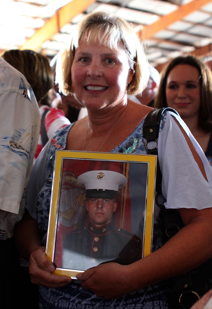 Shirley Corley holds up a photo of her son, Corporal Clifford Corley, who is currently serving in Afghanistan.