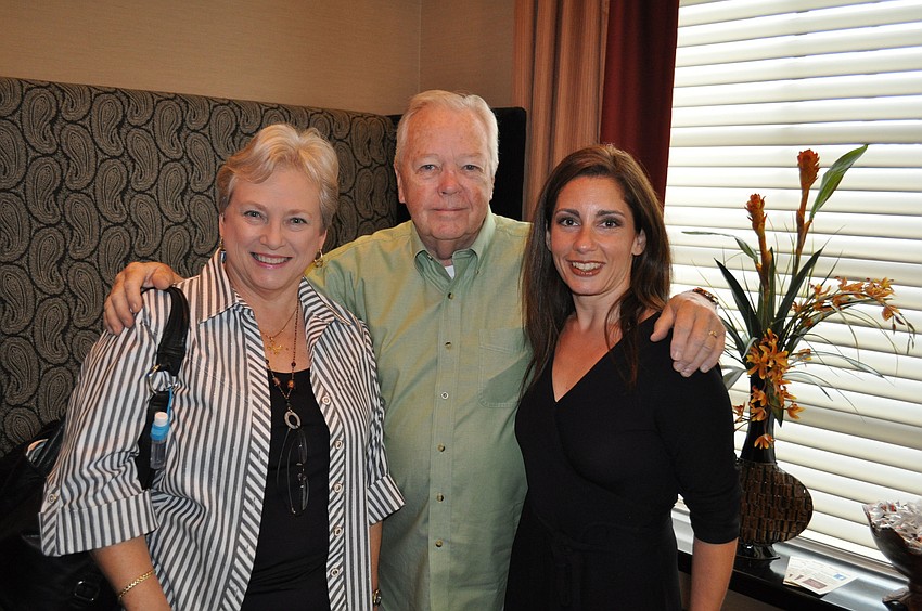 Eileen and Bob Parkinson of Trident Communications with Toni Artusa of PuroClean
