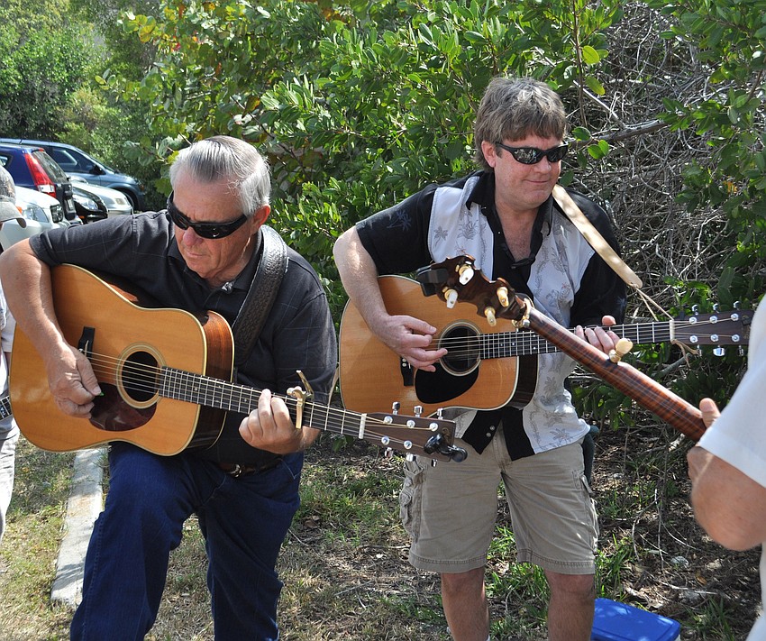Roger Schauer and Marty Girsch warm up before their performance.