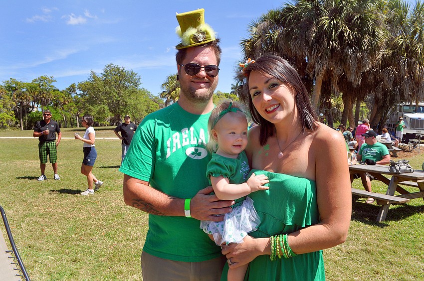 J.R., Kaliana, 1, and Elatia Michael all wore their best green, Saturday, March 17.