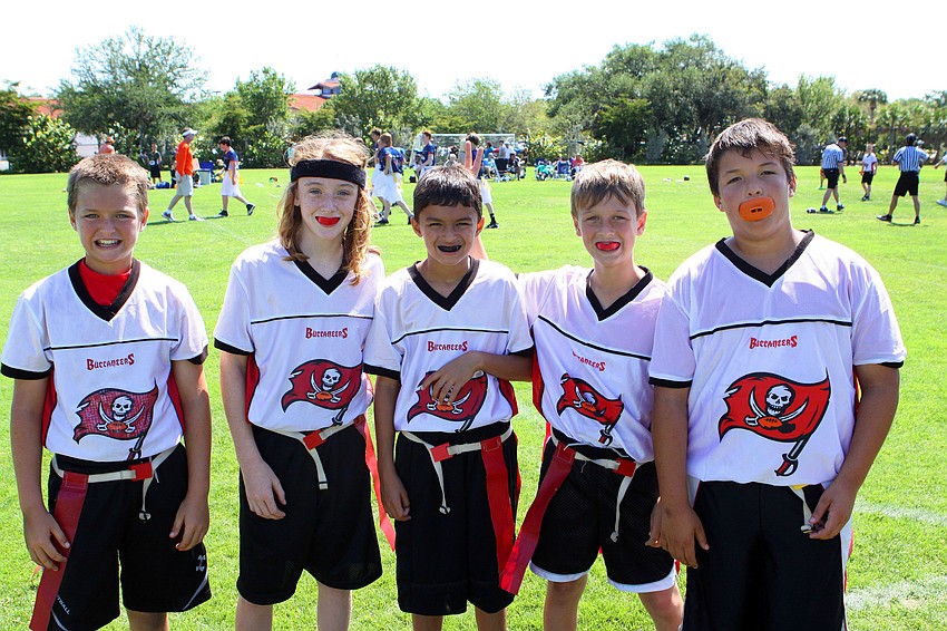 Jake Nash, 11, Zach Fairly, 11, Ryan Mason, 10, Tyler Kenney, 11, and Ian Beckmann, 10 all play for the Buccaneers.