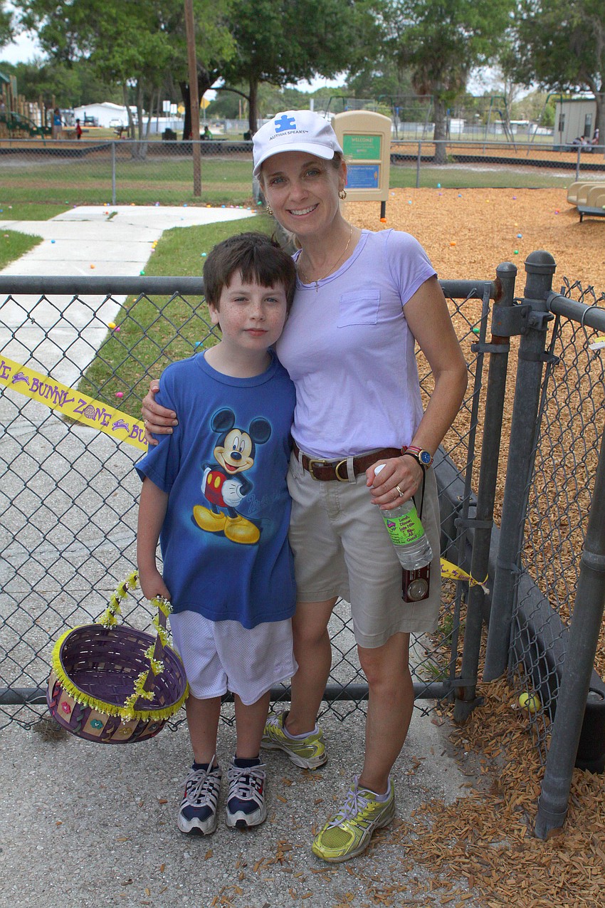 Kevin Sweeny, 10, and his mom, Monica Sweeney, one of the main coordinators of the egg hunt.