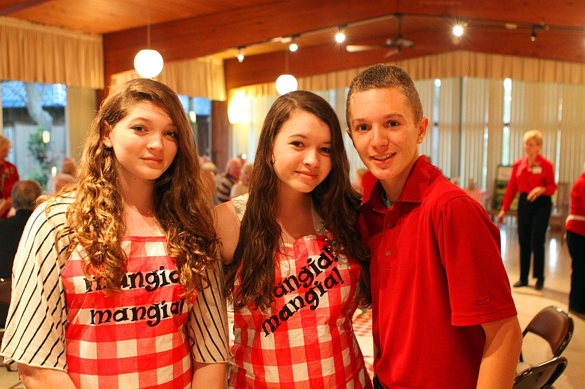Kate Walsh, Emma Walsh and JR Kennelly helped to serve at the spaghetti dinner, Saturday, Jan. 7 at the Sarasota Garden Club.