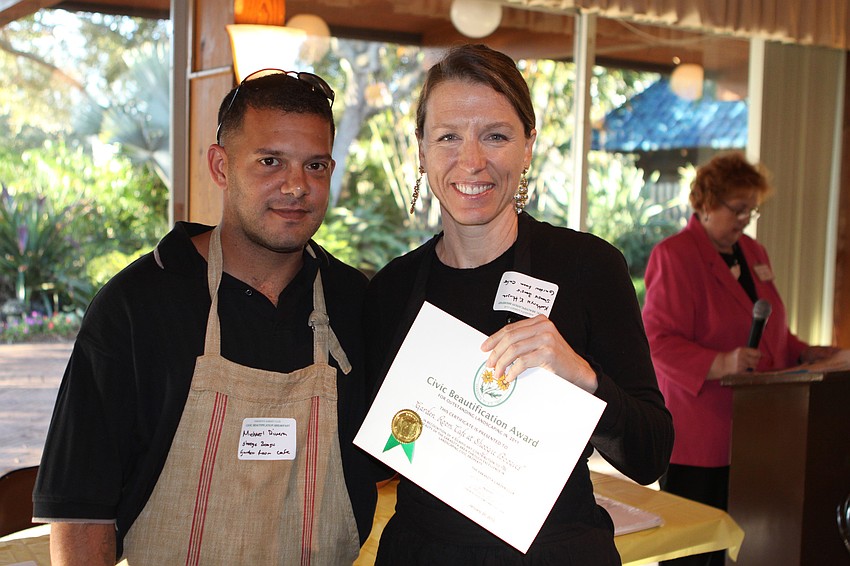 Michael Rivera and Kathryn Hingel won a civic beautification award for the Garden Room Cafe at Shoogie Boogies.