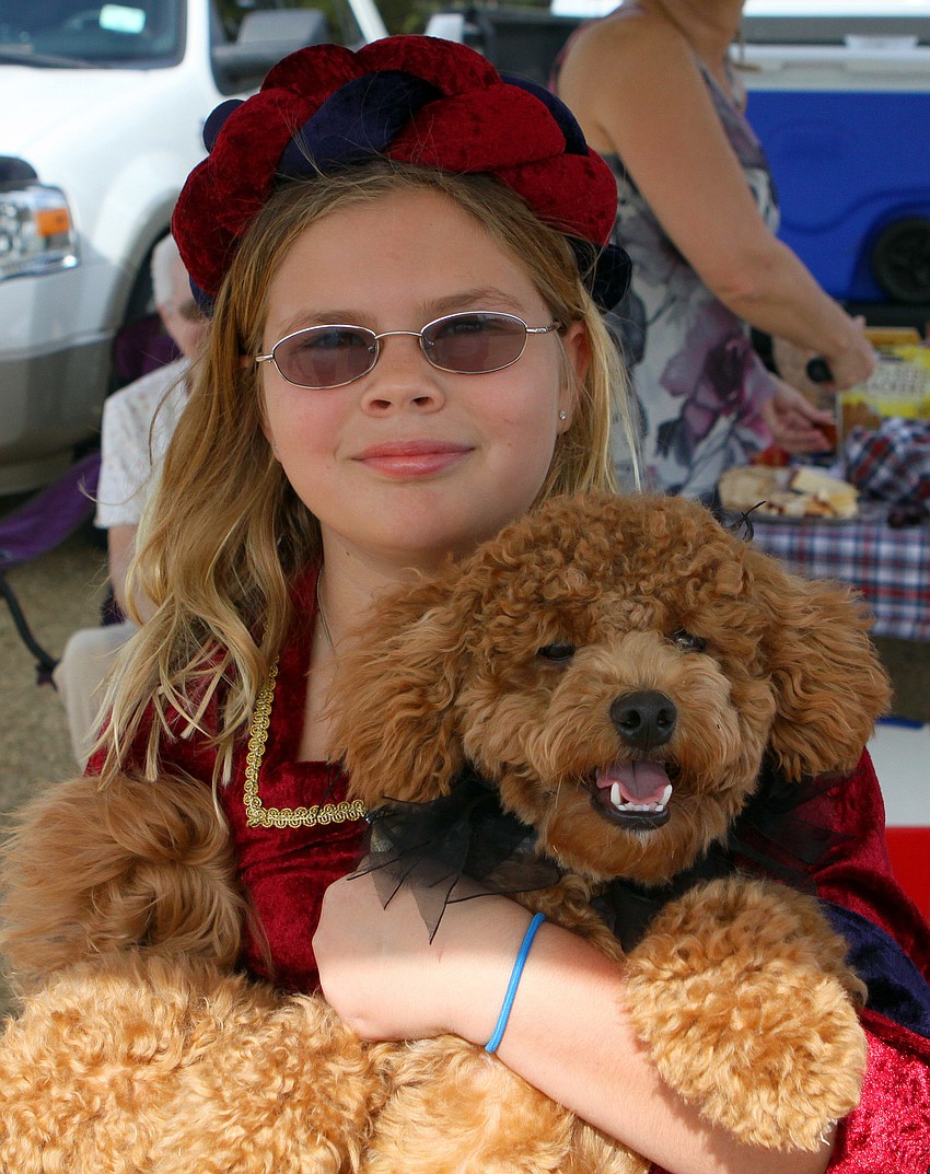 Laurel Seberg, 8, with her royal pup, Lindy.