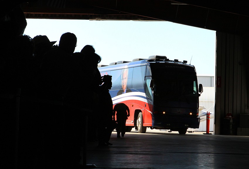 Newt Gingrich's bus pulls into Dolphin Aviation, Tuesday, Jan. 24.