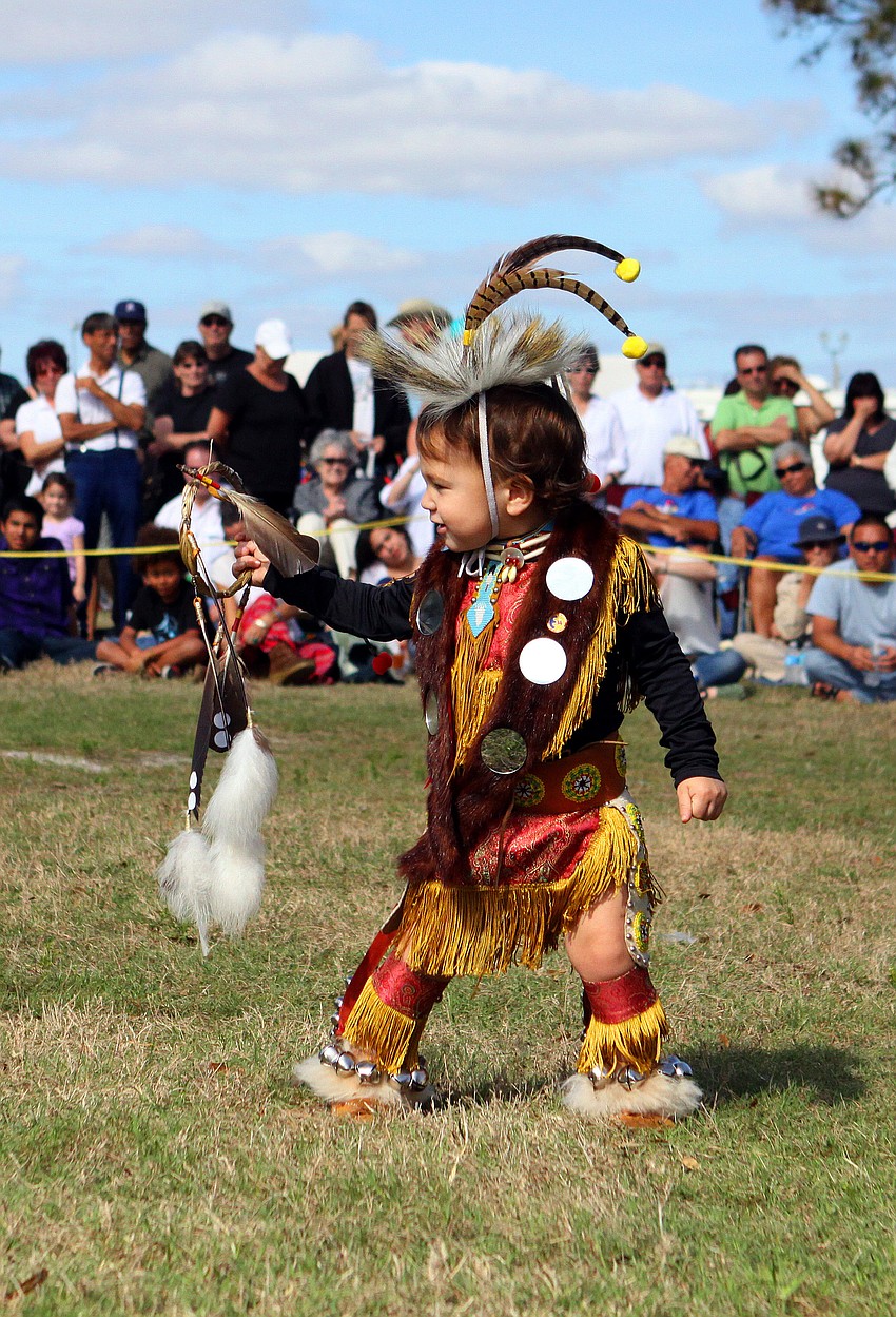 Dakoda Anquoe, 22 mos., does a Native American dance called the Chicken Dance, Saturday, Jan. 28, at the Fifth Annual Sarasota Indian Festival at the Sarasota Fairgrounds.