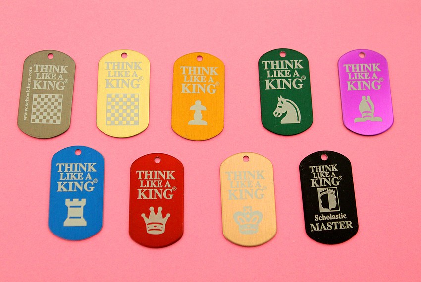 The students can collect chess themed dog tags by taking tests about chess knowledge and strategies.