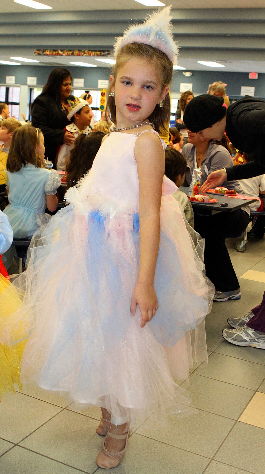 Caroline Russell, 6, walked around on her tiptoes and dressed up as the White Swan, Tuesday, Feb. 14, during Ashton Elementaryâ€™s Kindergarten Fairytale Day.