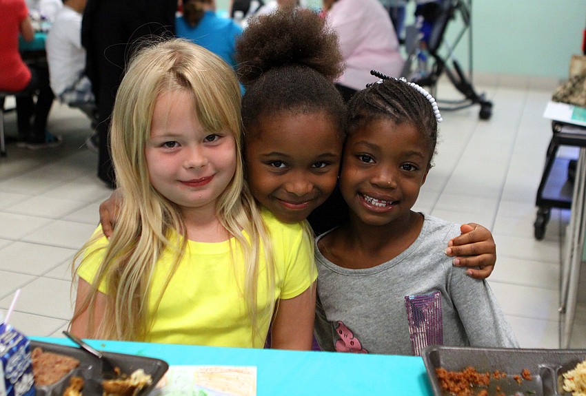 Marissa Roberts, 6, Tamara Miller, 7, and Angelique Brown, 6