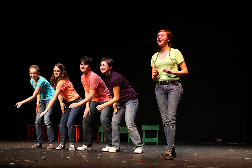 Natalie Almeter, 17, sings â€œA Noun Is A Person, Place or Thingâ€ while Haley Sylvester, 14, Meg Mitchell, 18, Danny Perrone, 17, and Elizabeth Panagopoulos, 15, dance in the background.