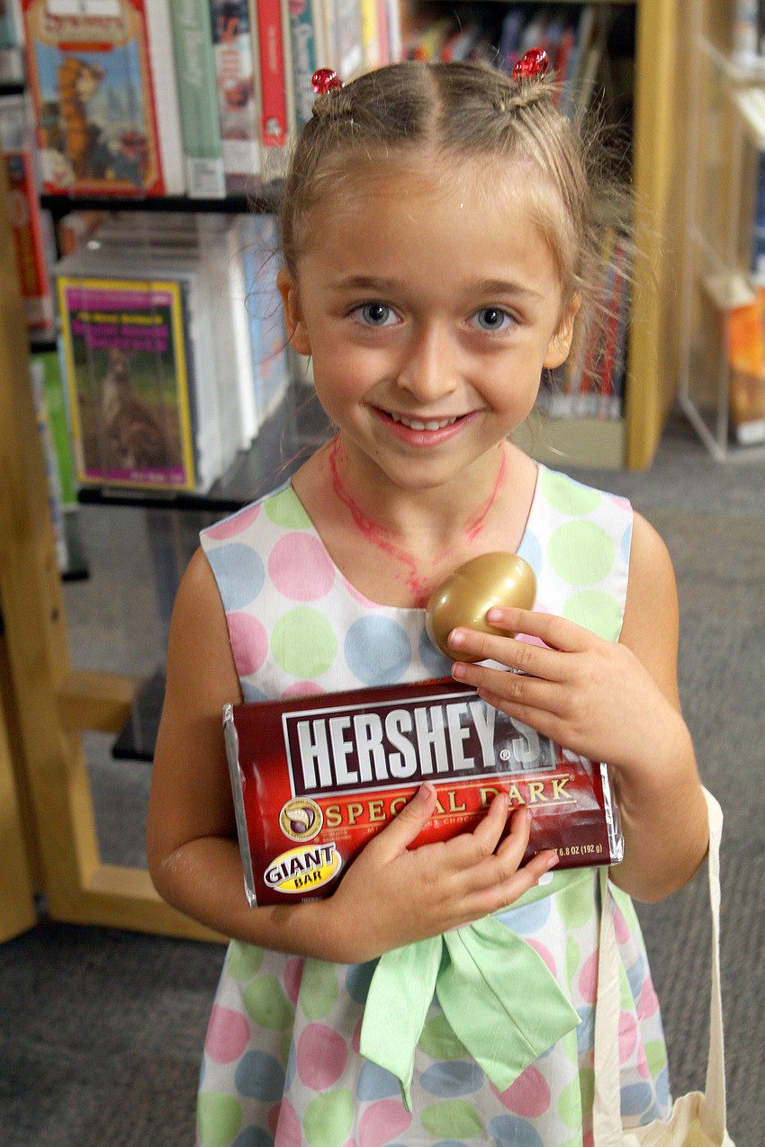 Hana Knowlton, 6, was the lucky finder of the golden egg in her age groupâ€™s treasure hunt, Saturday, March 31, at Gulf Gate Library. The middle groupâ€™s golden egg was hidden in a tissue box.