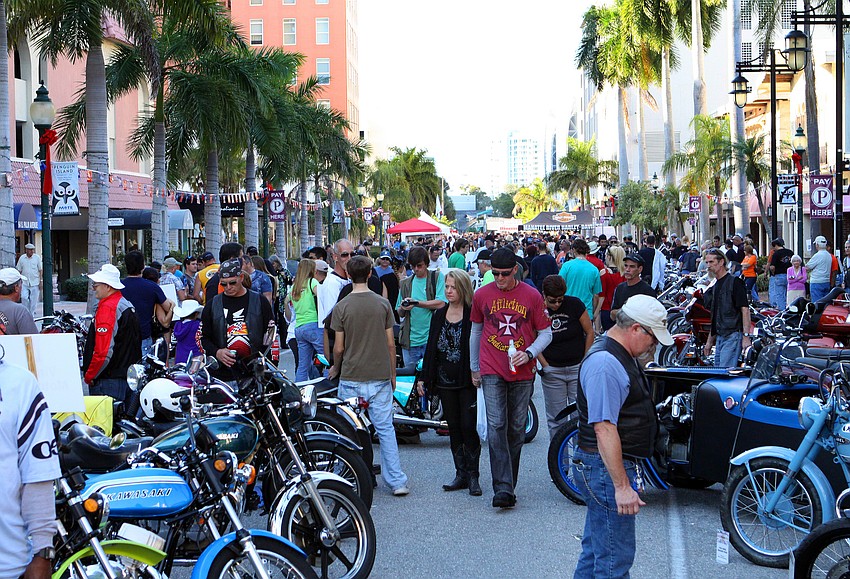 People make their way down Palm Avenue to check out a variety of different motorcycles, Sunday, Jan. 8, during the weekend long event, Thunder by the Bay.