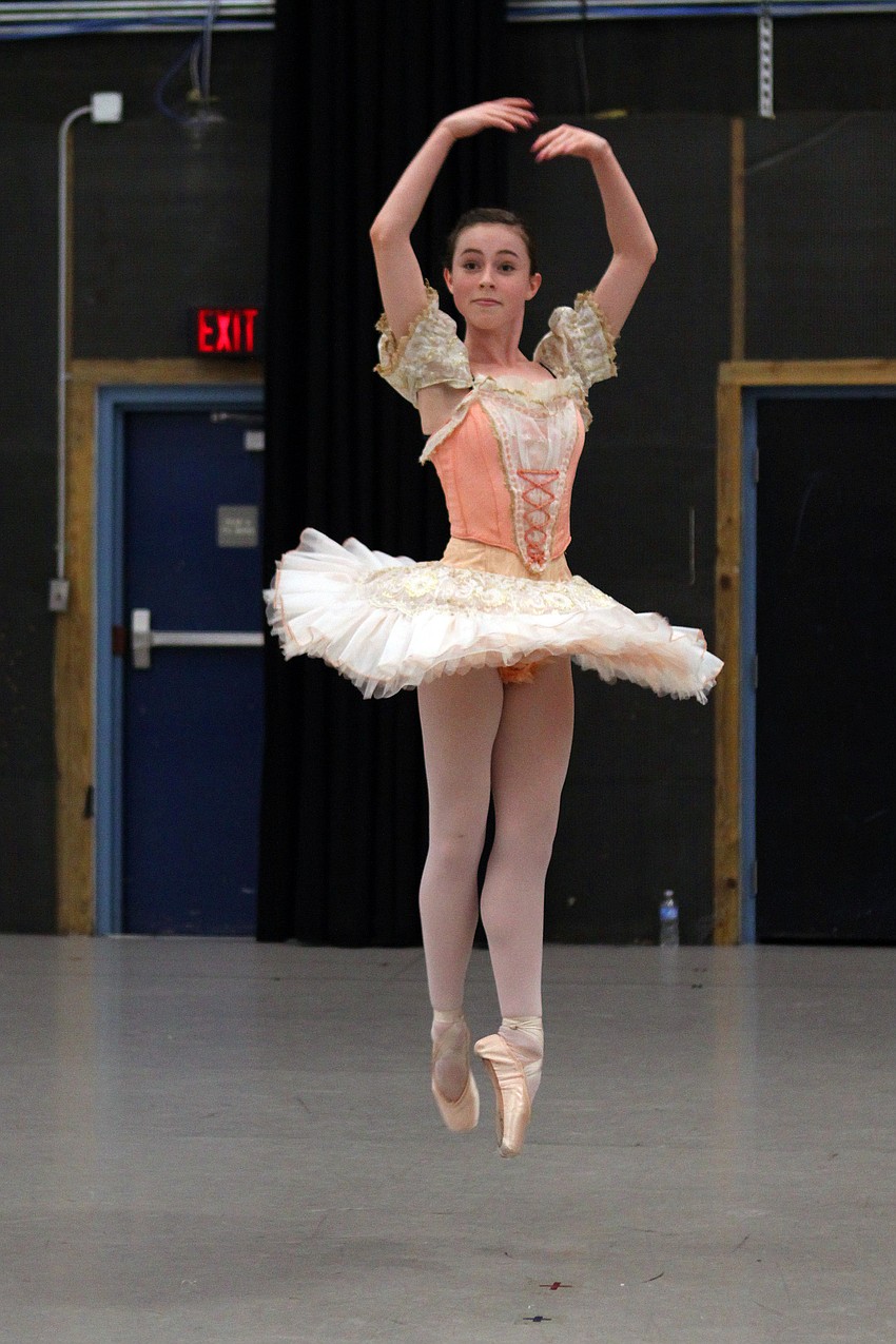 Allison Forsyth, 15, runs through her piece, pas de trios variation from Swan Lake, during a dress rehearsal, Wednesday, Jan. 18, at the Asolo.