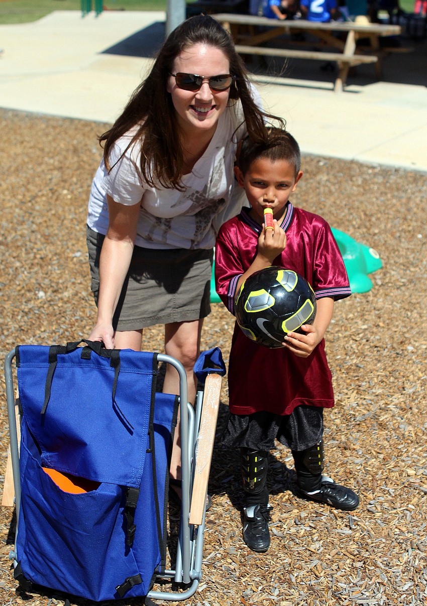 Robin Nystrom with her son, Knowlan, 6, after his game, Saturday out at Glebe Park.