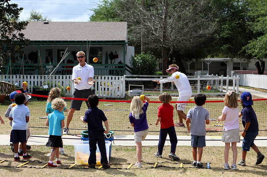 The 3-6 year olds throw tennis nerf balls at the coaches.