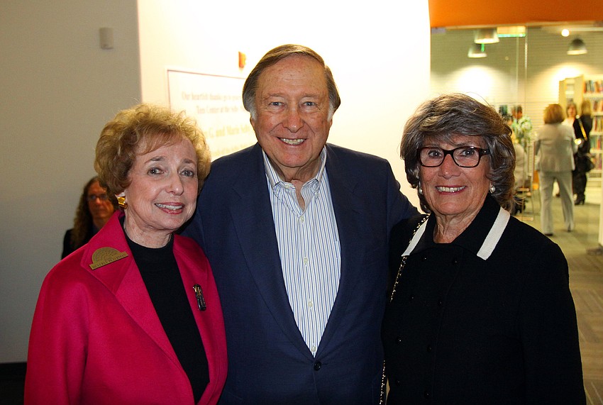 Beverly and Ira Peterman pose with Arline Steinberg Friday, Jan. 13, at Selby Public Library's Looking Into the Crystal Ball event.