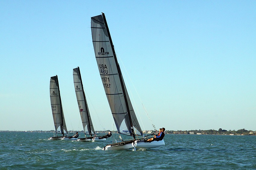 Members of the Sarasota Multihull team practice out in the Bay.