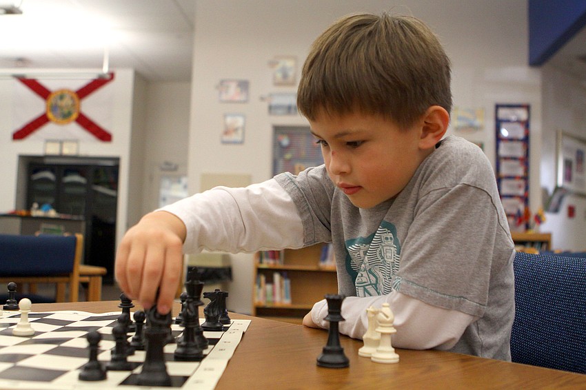 Kai Meighan makes a move during his first game in the tournament.