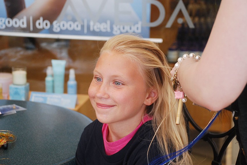 Lillian Chapman getting hair extensions in her hair at Nuovo