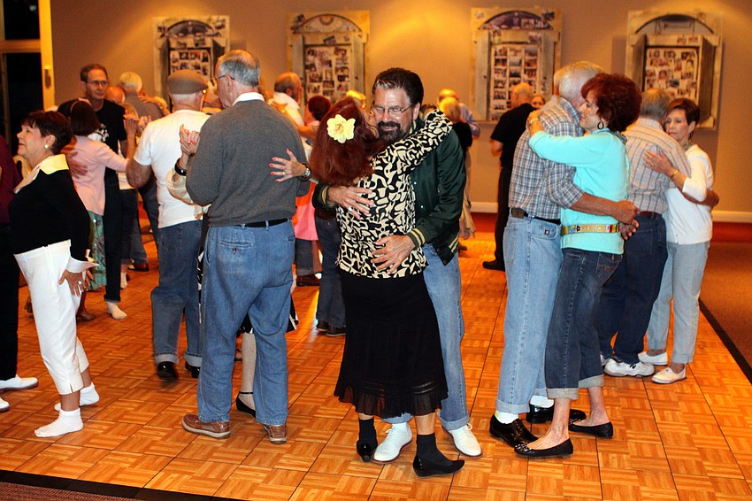 Couples dance to a slow song, Saturday, April 21, at Temple Sinaiâ€™s 50s Sock Hop fundraiser.