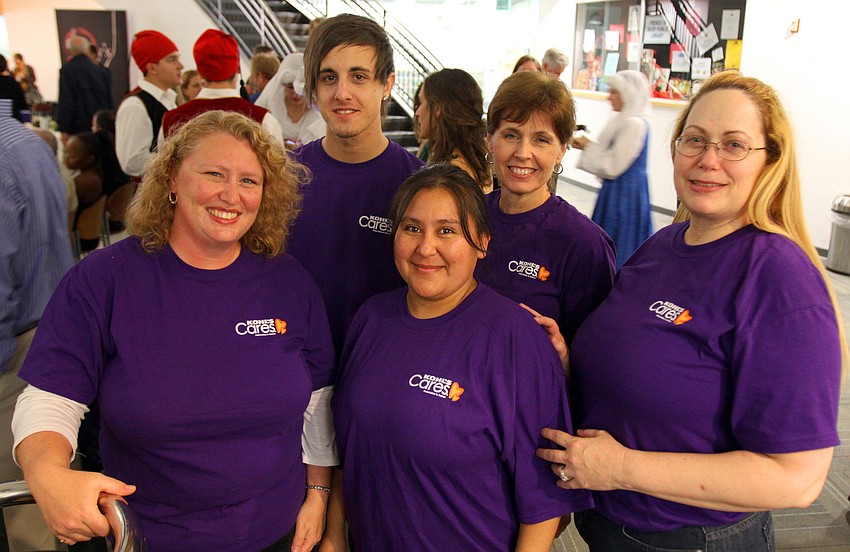Heather Ronald, Alec Simon, Yanderi Torres, Mary Ellen Mosti and Marianne Heaton of Kohl's Cares volunteered their time, Friday, Jan. 13, at Selby Public Library's Looking Into the Crystal Ball event.