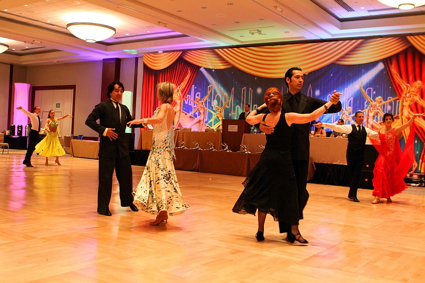 Multiple couples perform in one of the many 