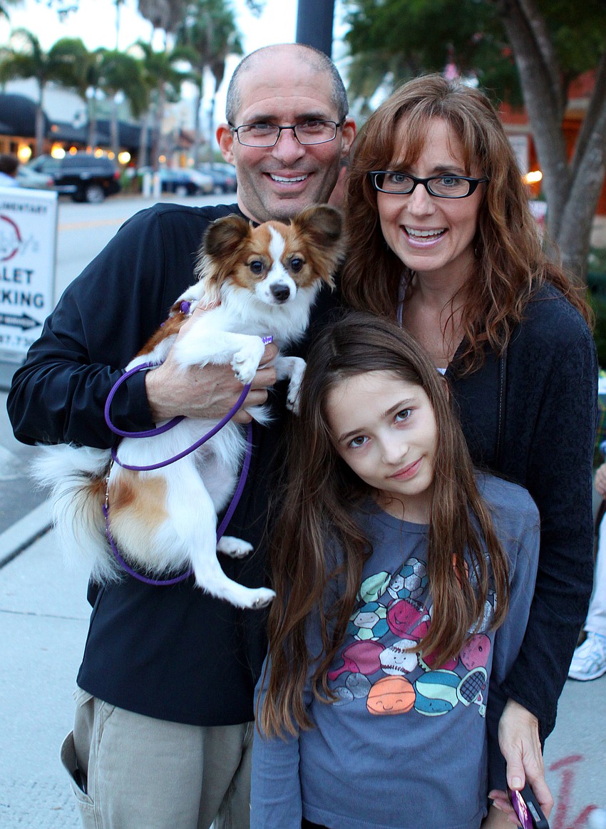 Steven Paley and Cyndee Bloom with their daughter, Hannah Paley, and their dog, Pumpkin.