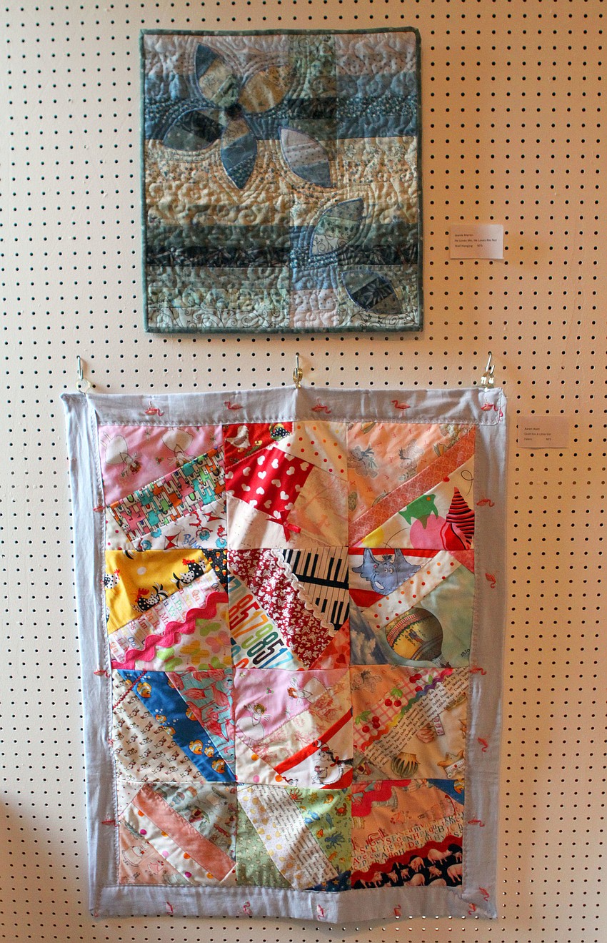 Karen Watt and Jeanie Martin made quilts that were on display for the Pelican Cove Art Show.