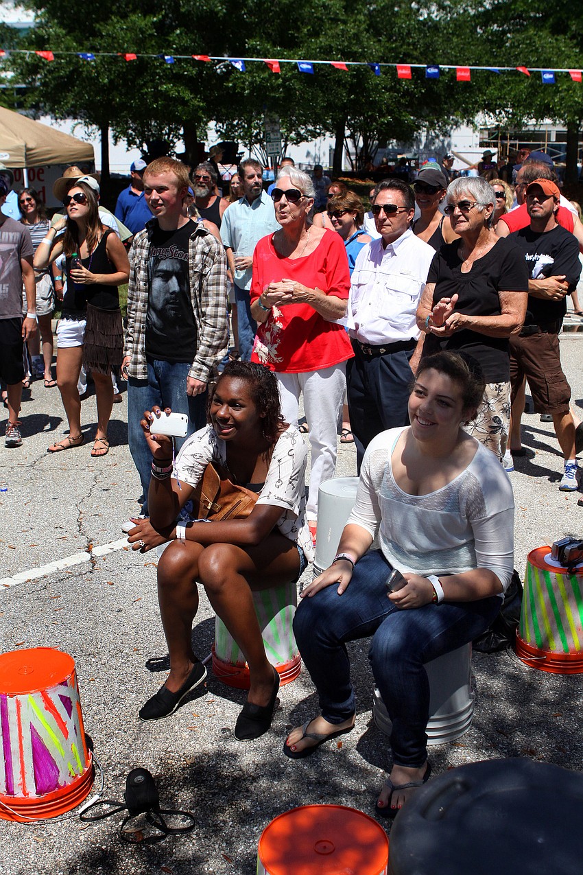 People have fun watching Colors in the Dark, Sunday, March 25, at the 17th annual Giving Hunger the Blues festival.