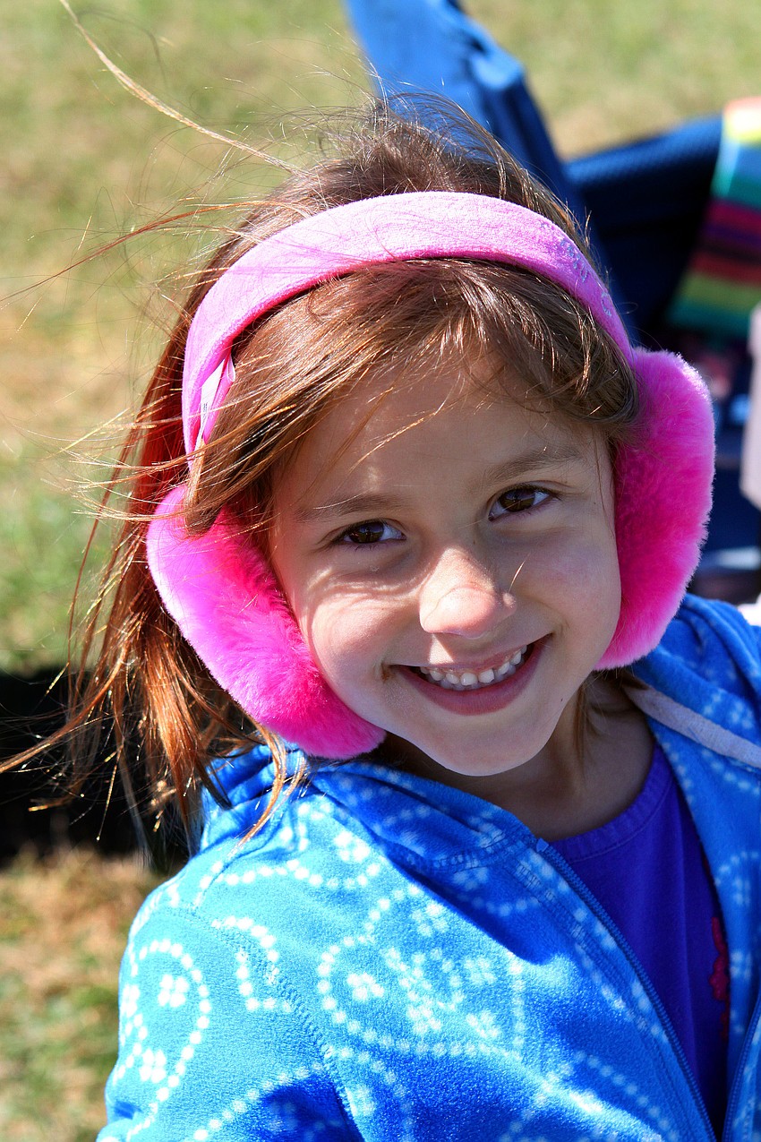 Sophia D'Orazio wore some fun hot pink earmuffs to the polo game, Sunday, Feb. 12.