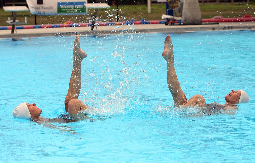 Debbie Robertson and Laura Cleary perform a duet together, Sunday, Feb. 19, at the Selby Aquatics Center at the Sarasota Family YMCA.