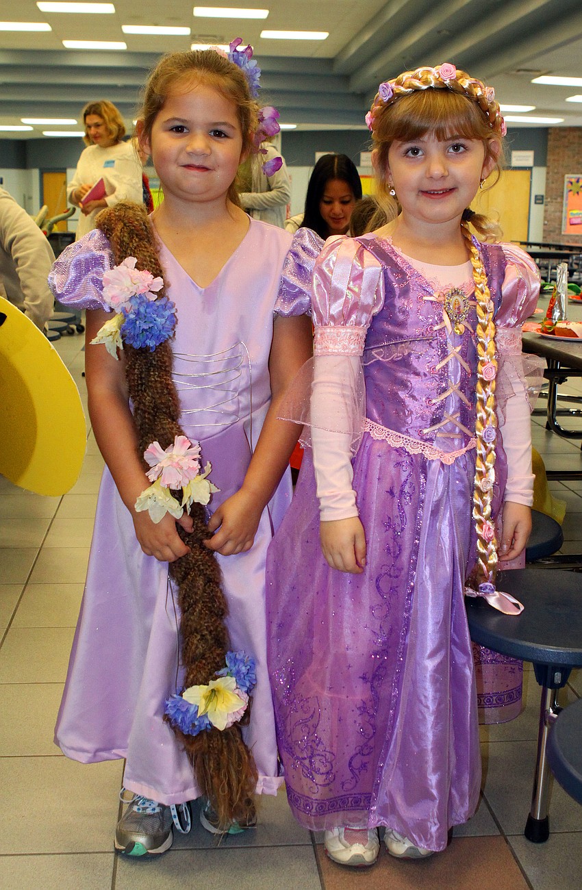 Alexandra Witherspoon, 5, and Kylie Renda, 6, both dressed up as Rapunzel.