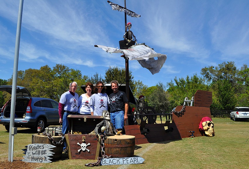 Carmen and Robin Spagnola pose with Debbie and Gary Knoflica in front of their 