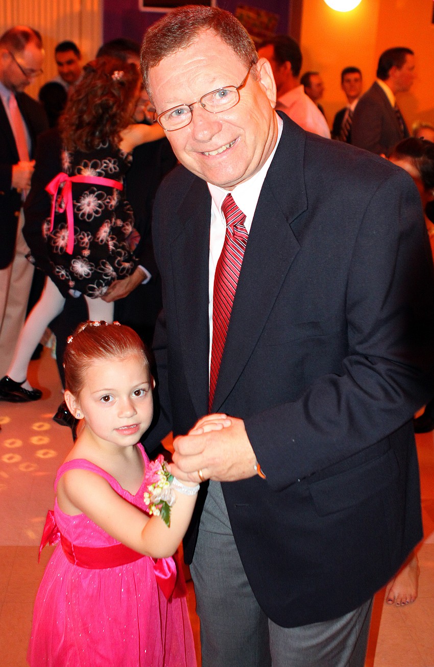 Emma Smith, 5 Â½, dances with her grandfather, Bob Greenwald.