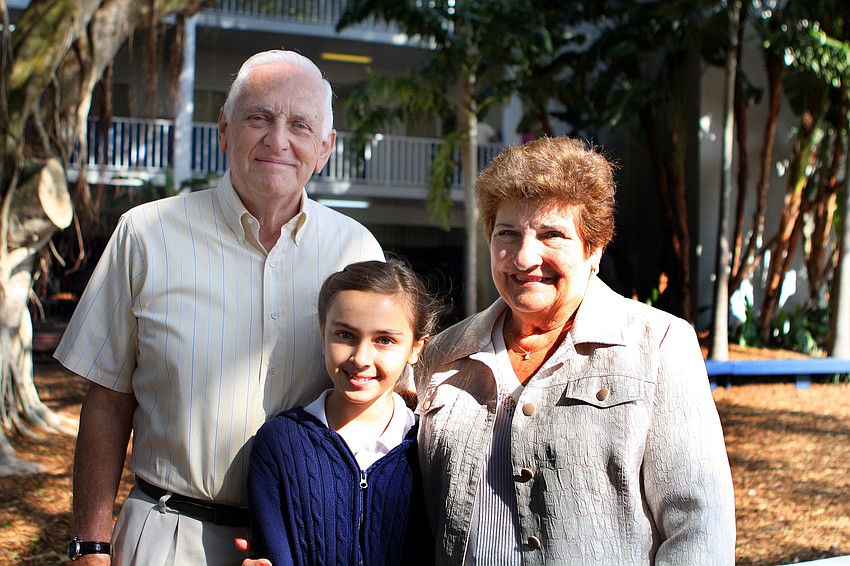 Bob and Marie Wyatt pose with their granddaughter, Christy Wyatt, 5th grade.