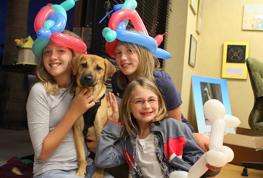 Crystal Mavrikas, 11, Emily Govaars, 11, and Meghan Govaars, 9, with Jessie
