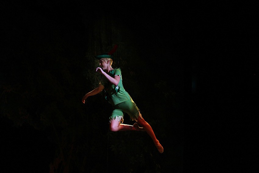 Claudia Rightmire flies through the air as Peter Pan in â€œPeter Pan Selectionsâ€.