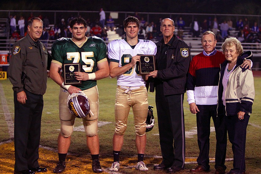 Sheriff Tom Knight, Connor Kruge, Adam Vining and Sheriff Brad Steube pose with Ben and Barbara Price