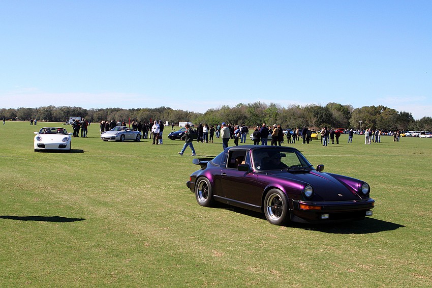 The Porsches had a parade around and across the polo field.