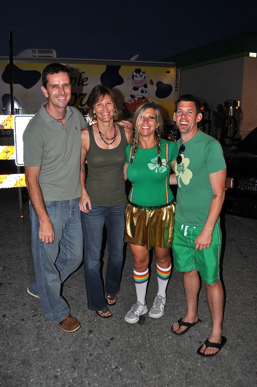 Doug and Gena Smoot with Patti and Charley Elsey out in front of the Shamrock Pub, Saturday, March 17.