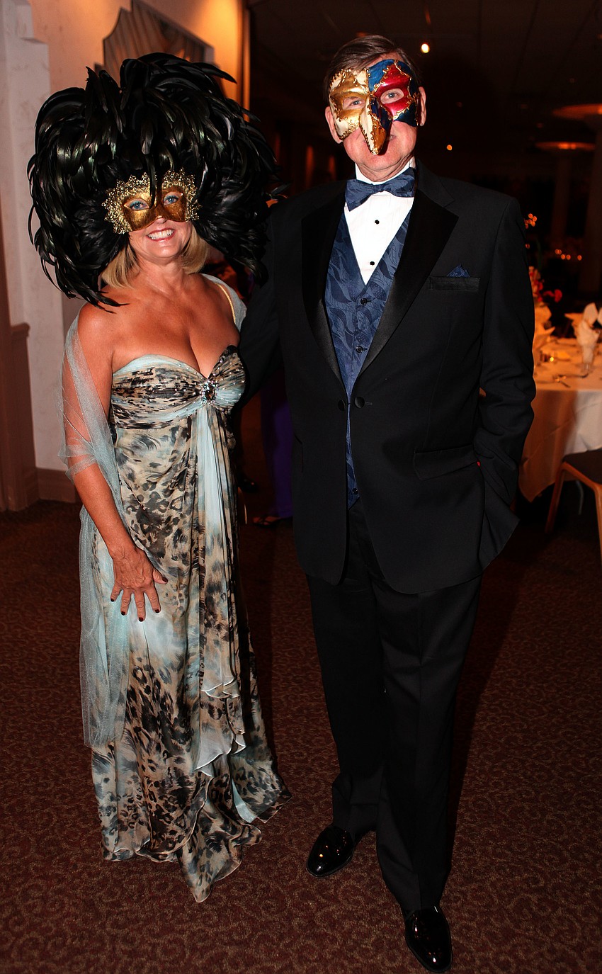 Sherri and Chet Wanvig wore their masks that they bought in Venice, Italy.