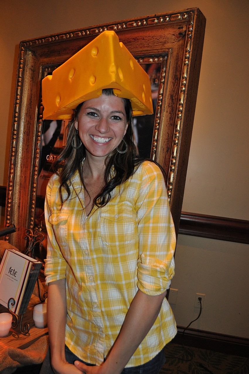 Kelly Mason, of Fete Catering, helped guests with a mac nâ€™ cheese ball with a cheese sauce.