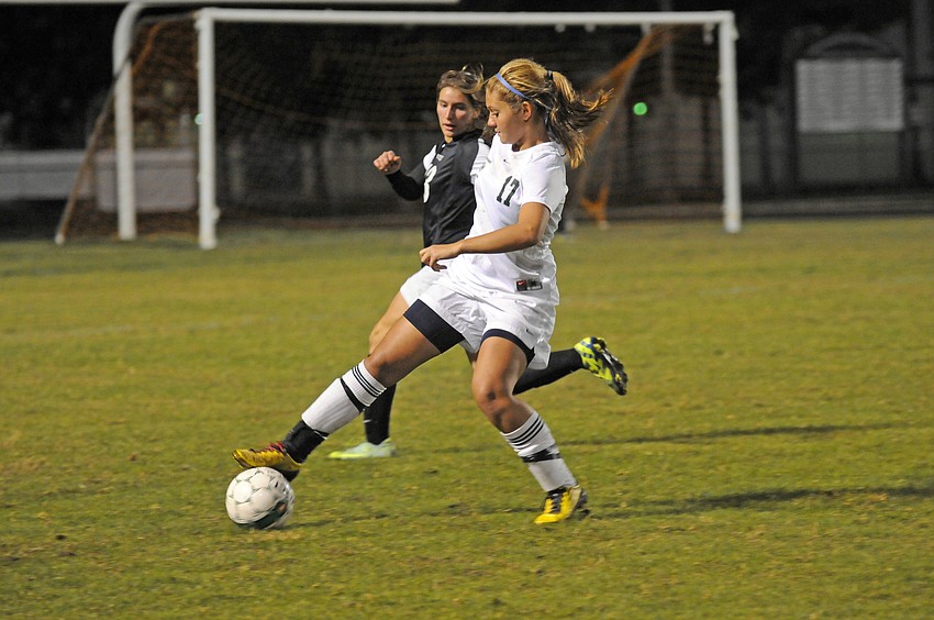 Lakewood Ranchâ€™s Morgan Salmon battles Braden Riverâ€™s Jenny Linde for the ball during the second half.