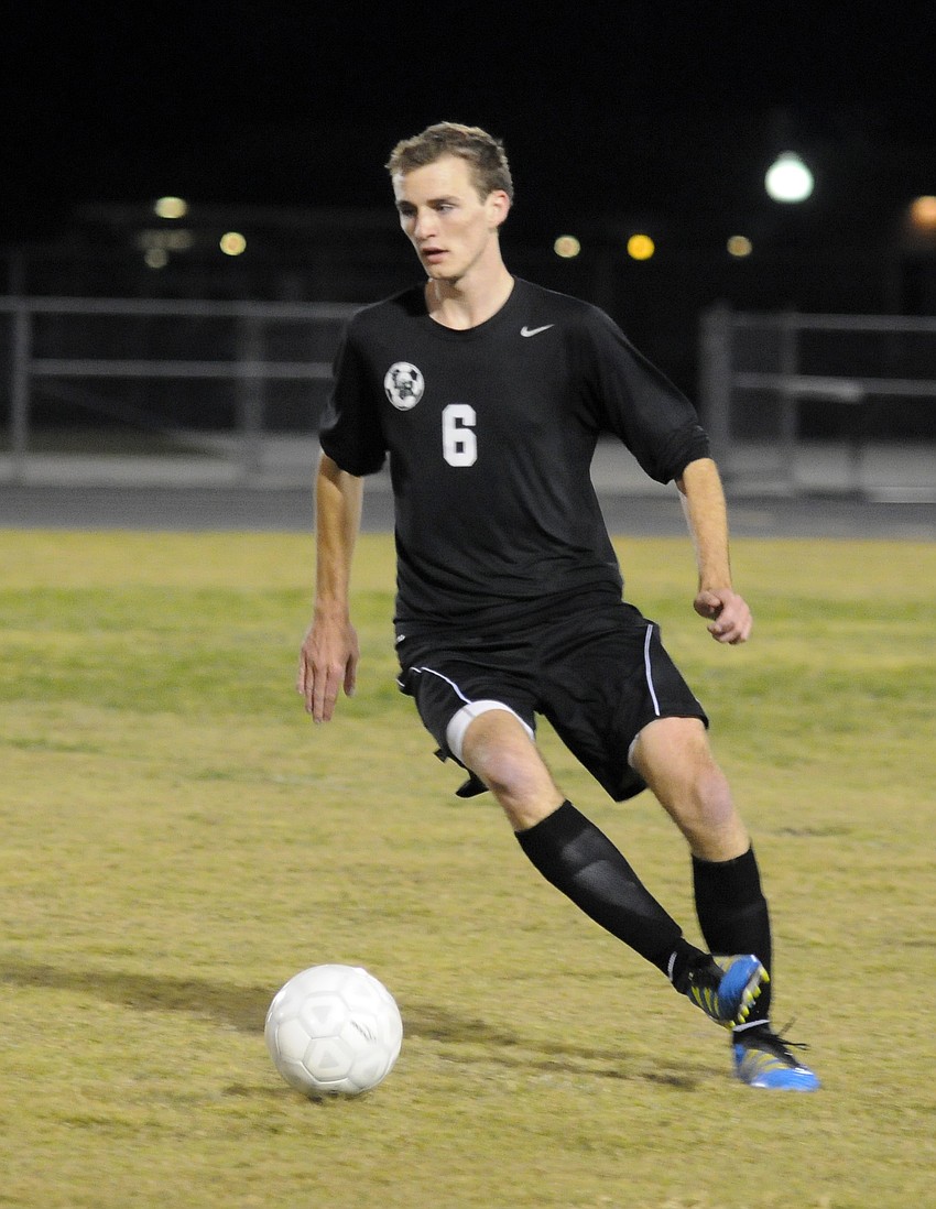 Lakewood Ranch senior Blake Thompson brings the ball up the field.