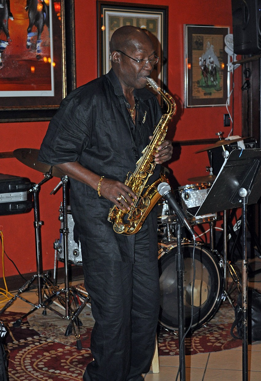 Les DaCosta entertained guests on the saxophone.
