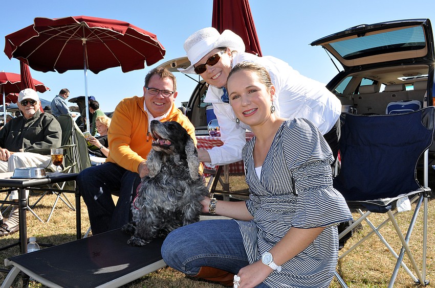 John and Angela Campanella, with their English Cocker Spaniel George, and Lauren Redington spent the afternoon tailgating with George and Friends.