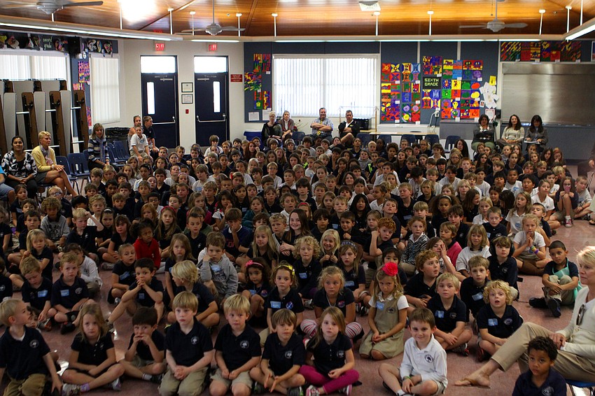 Preschool through 6th grade sat in the cafeteria to listen to Dan Strzempka, Friday, Jan. 20, at Out-of-Door Academy.