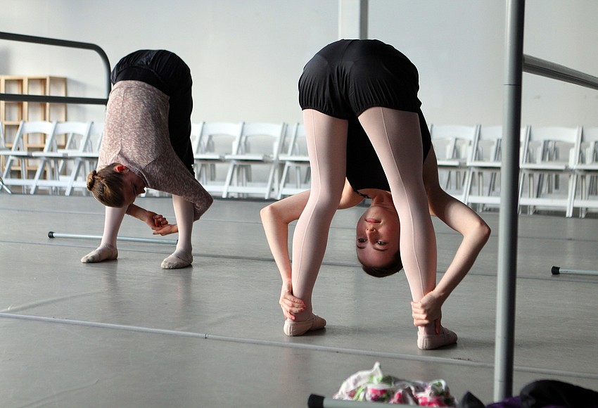 Your Observer | Photo - Allison Forsyth, 15, does some stretching ...